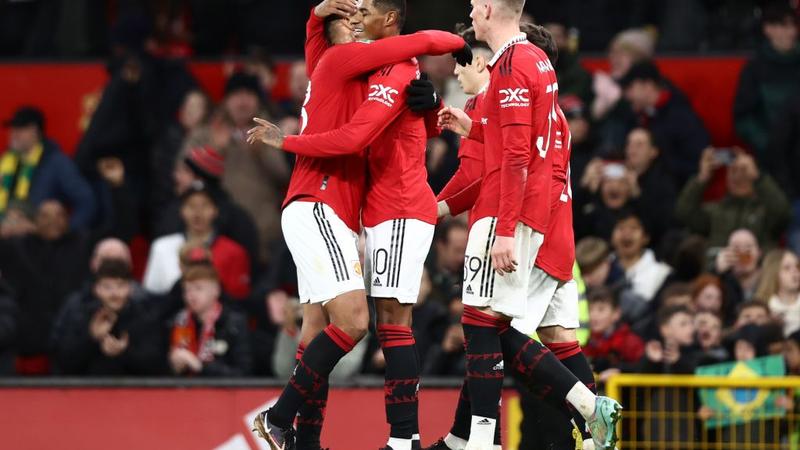 Rashford late show fires Man United into last four